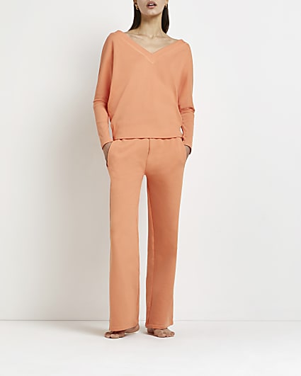 Coral ribbed flared trousers