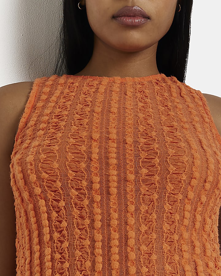 Coral textured lace sleeveless top
