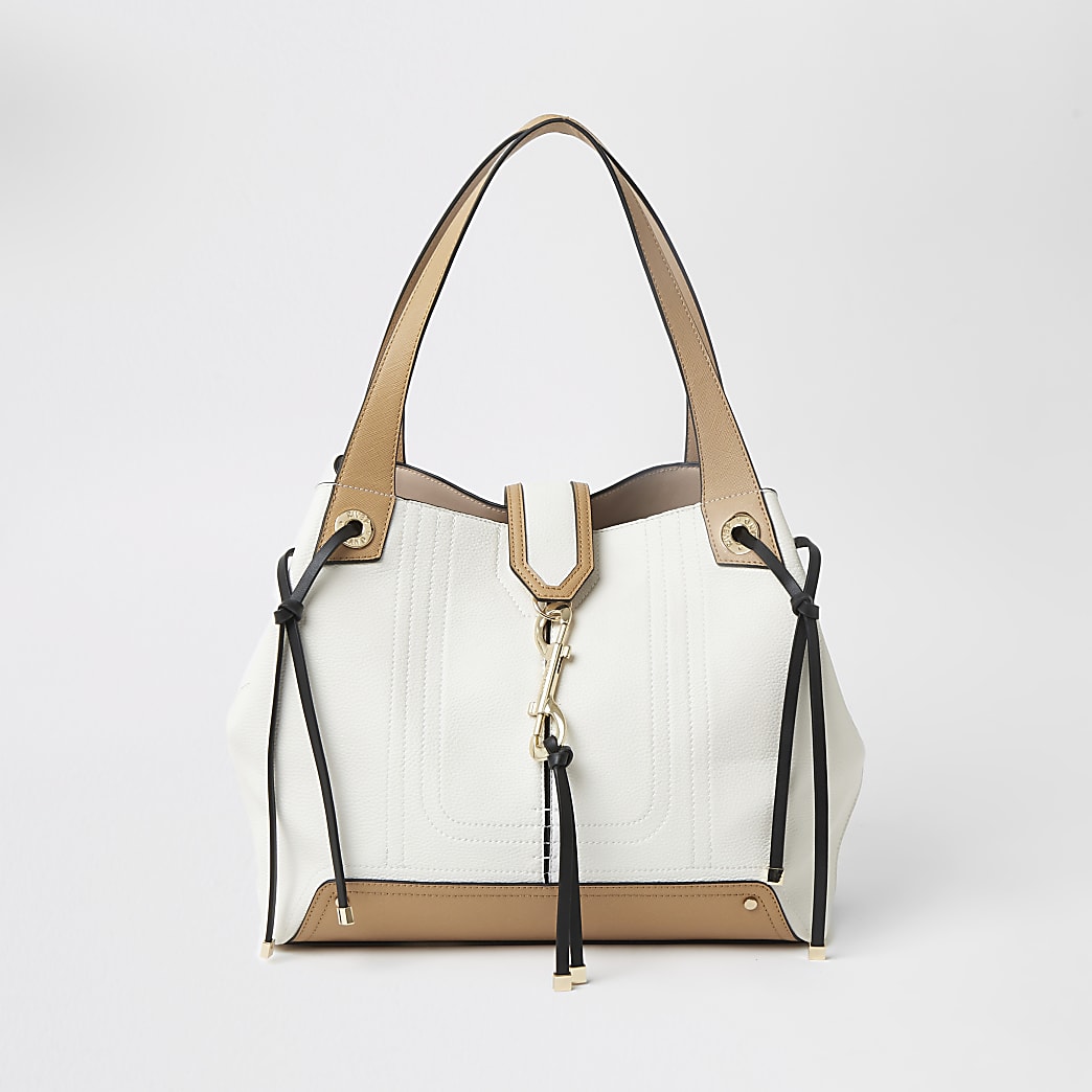 Cream and tan clip front slouch bag | River Island