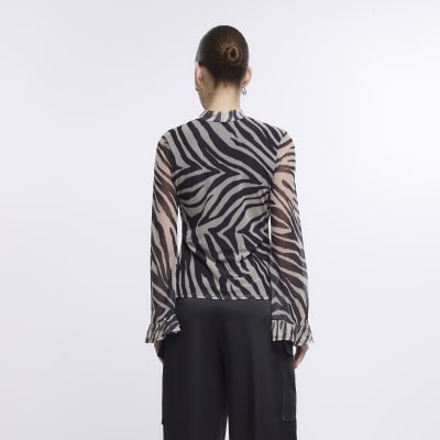 Cream animal print long sleeve blouse