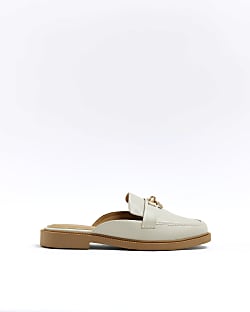 Cream backless loafers