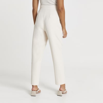 Cream button front peg trousers