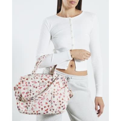 Cream Canvas Heart Print Holdall bag