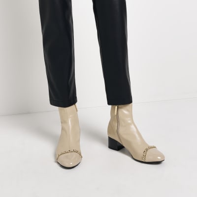 Cream chain heeled ankle boots River Island