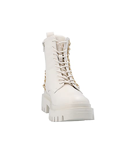 360 degree animation of product Cream chain lace up chunky boots frame-20