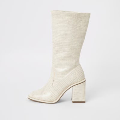 cream calf length boots