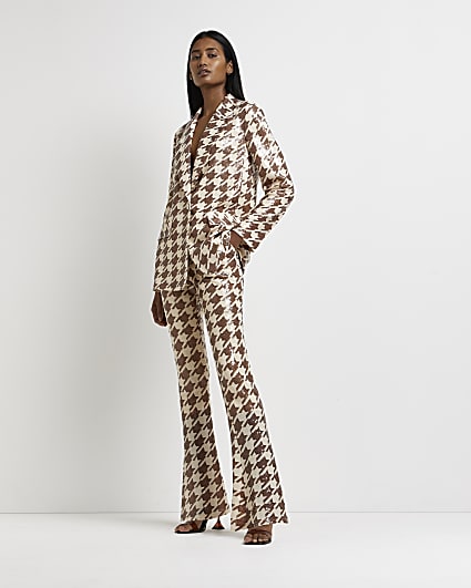 Cream dogtooth sequin flared trousers