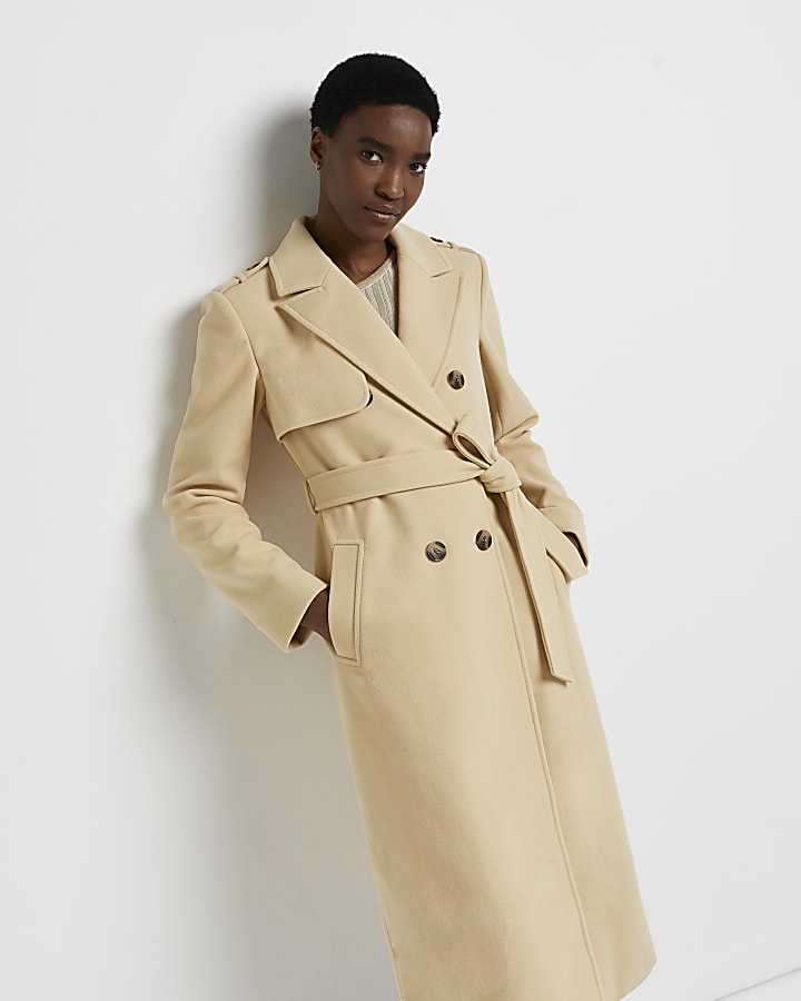 Cream double breasted belted trench coat