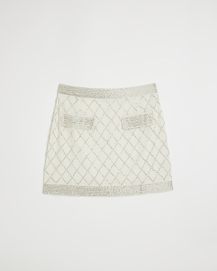 Cream embellished mini skirt