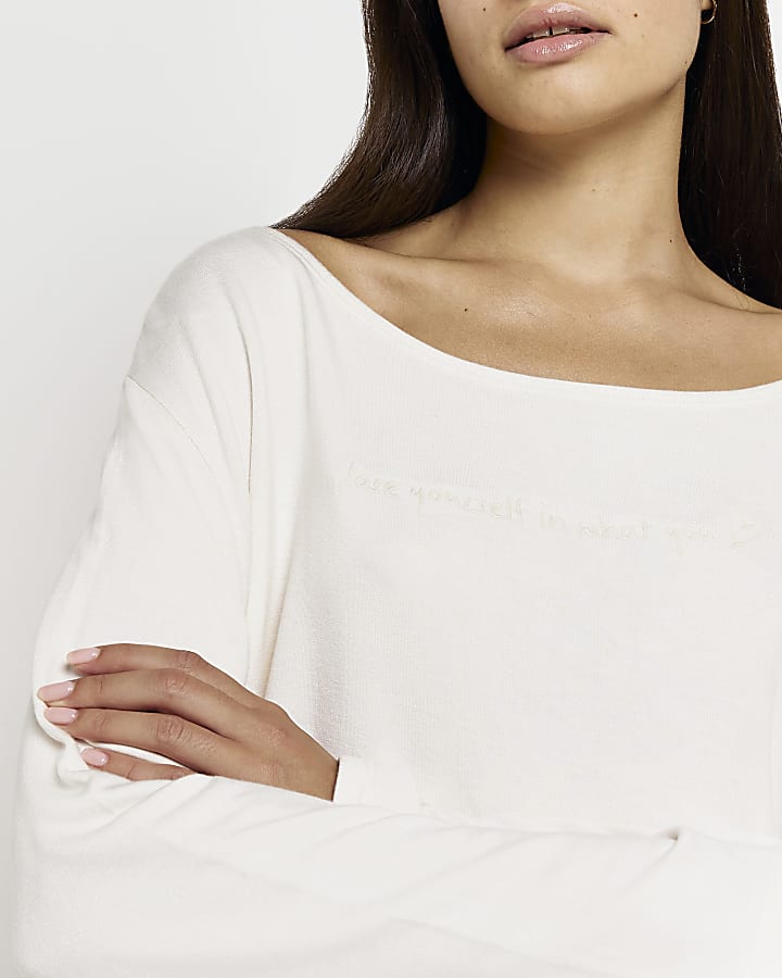 Cream embroidered long sleeve top