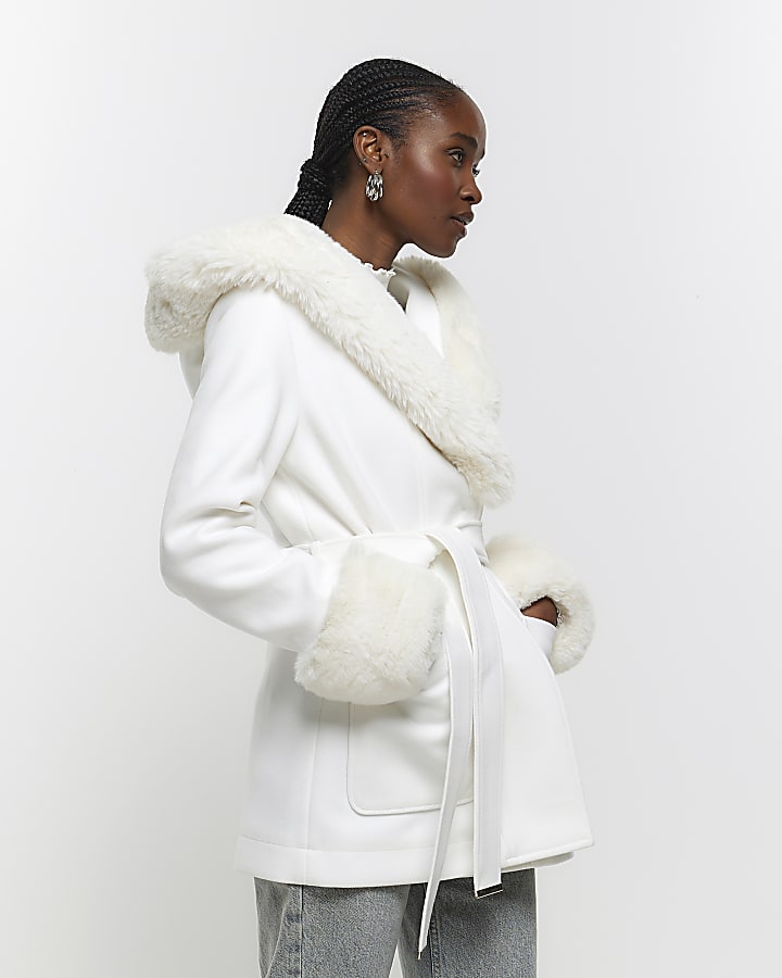 Cream faux fur belted coat | River Island