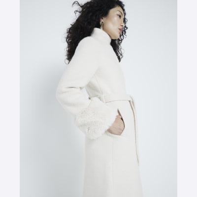 Cream faux fur cuff longline coat River Island