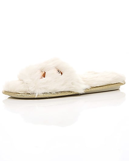 360 degree animation of product Cream faux fur embellished mules frame-23