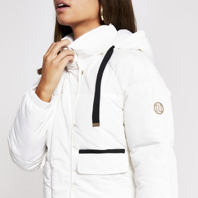 cream padded jacket with fur hood