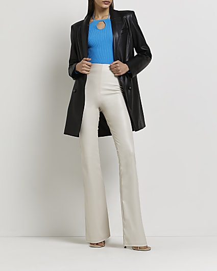 Cream faux leather flared trousers