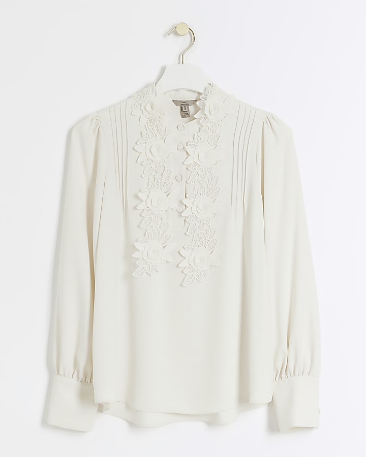 Cream floral long sleeve blouse | River Island