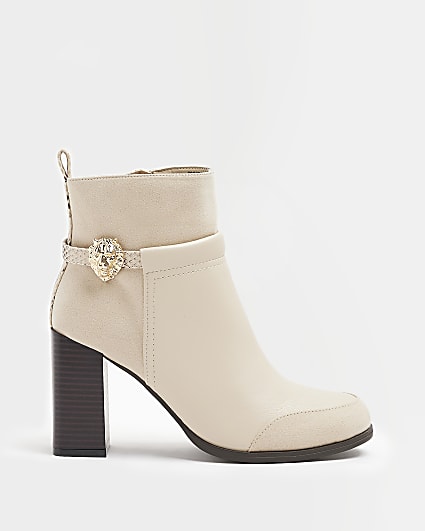 Cream heeled ankle boots