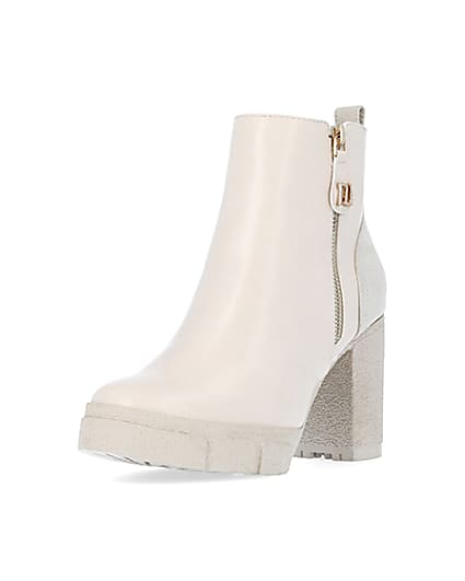 360 degree animation of product Cream heeled ankle boots frame-0
