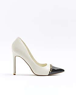 Cream heeled court shoes