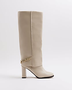 Cream heeled knee high fold over boots