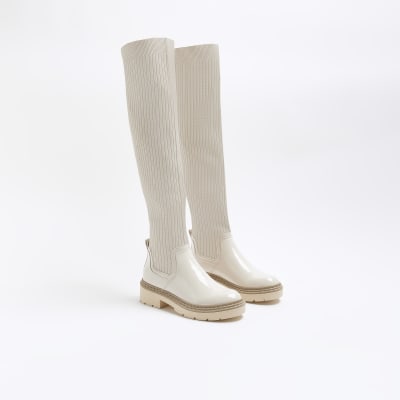 Cream knitted high leg boots River Island