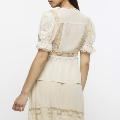 Cream lace embroidered peplum blouse River Island