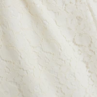 Cream lace flared trousers River Island
