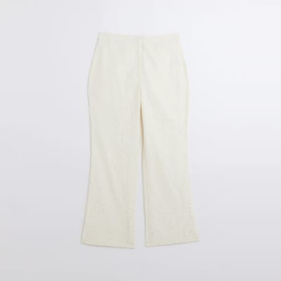 Cream lace flared trousers River Island