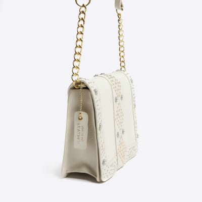Cream leather studded cross body bag River Island