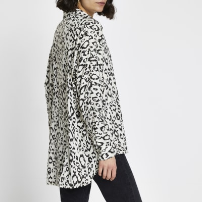 Cream leopard print dipped hem shirt