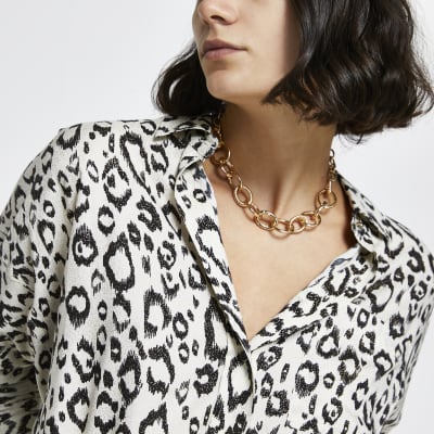 Cream leopard print dipped hem shirt