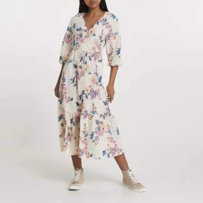 cream colored long sleeve dress