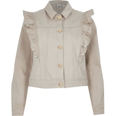 denim jacket with tan sleeves