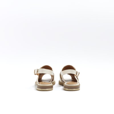 Cream open toe sling back shoes