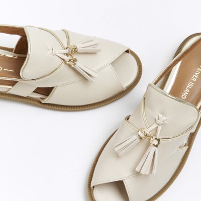 Cream open toe sling back shoes