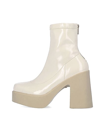360 degree animation of product Cream patent heeled ankle boots frame-4