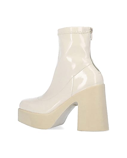 360 degree animation of product Cream patent heeled ankle boots frame-5