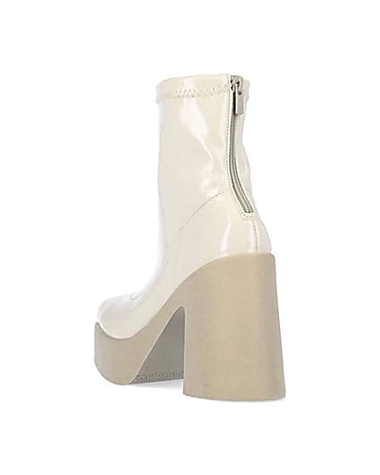 360 degree animation of product Cream patent heeled ankle boots frame-7