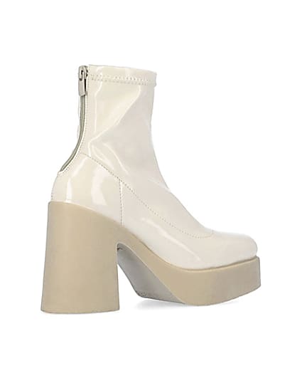 360 degree animation of product Cream patent heeled ankle boots frame-13