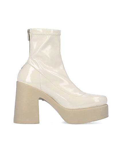 360 degree animation of product Cream patent heeled ankle boots frame-15