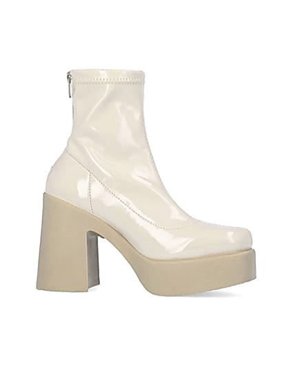 360 degree animation of product Cream patent heeled ankle boots frame-16