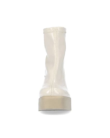 360 degree animation of product Cream patent heeled ankle boots frame-21