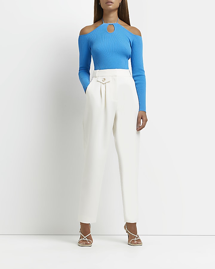 Cream pleated tapered trousers