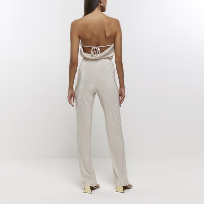 Cream plisse flared trousers River Island