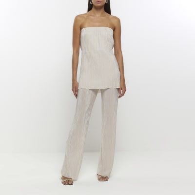 Cream plisse flared trousers River Island