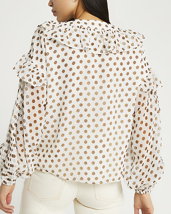 Cream polka dot blouse