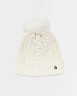 Cream pom pom cable knit beanie hat