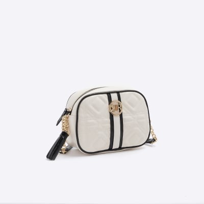Cream quilted boxy cross body bag River Island