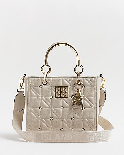 Cream quilted pearl tote bag