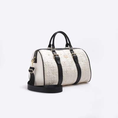 Cream quilted pearl travel bag River Island